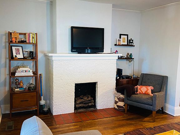 Brick hearth with historic fixtures.