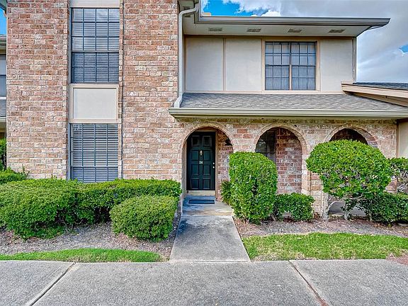 Pretty brick exterior and covered front porch area - lets go inside and see what this home has to offer.