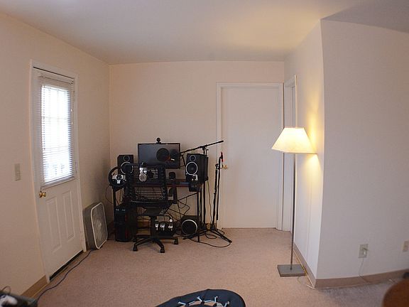 Main living area with bedroom 1 door