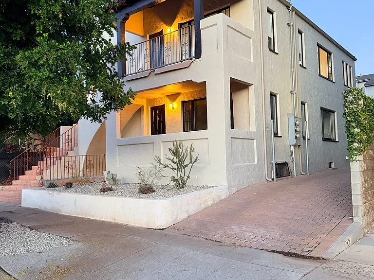 upstairs unit is entire top floor and balcony with own address