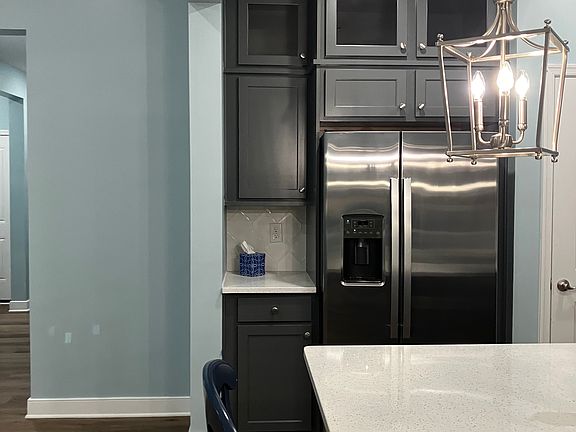 GE Profile refrigerator in kitchen