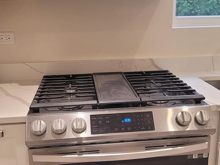 Self cleaning oven w/Convection & Dehydrator options; 5 Burner Gas cooktop; over the range Microwave Oven