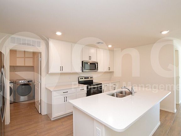 3rd image of 7951 N Scholes Ave