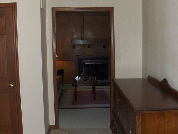 Gracious foyer has custom tile 