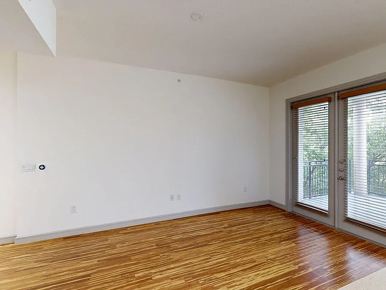 Apartment Living Room with Wood-Style Flooring.