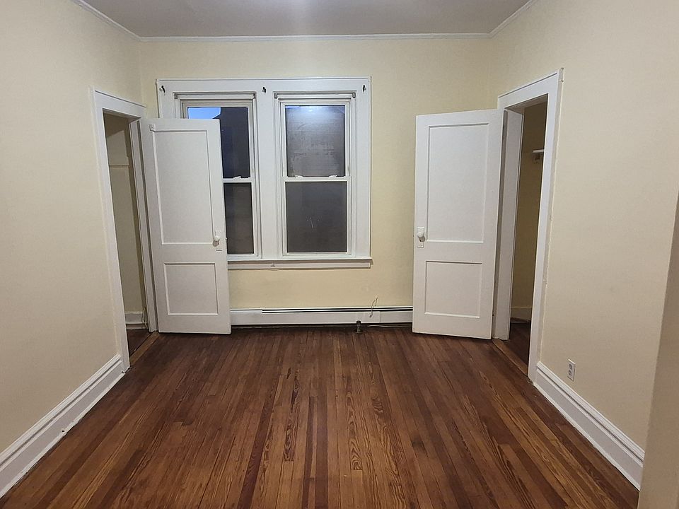 Bedroom with his & her closets