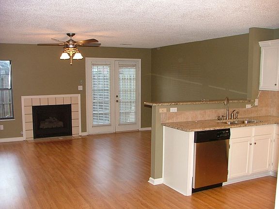 gas fireplace, laminate wood floors
