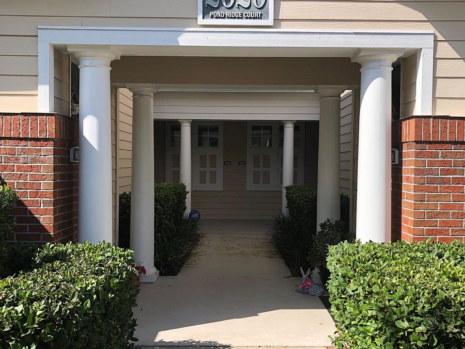 Entrance to unit, condo is down the walkway and on the left