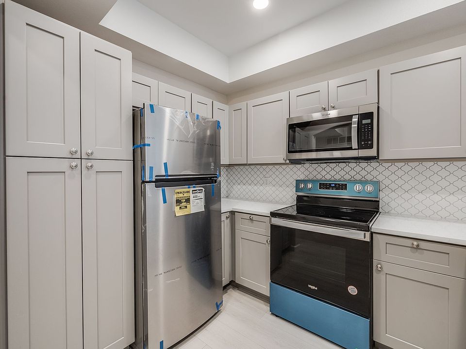 Kitchen with brand new appliances, cabinets, and countertops