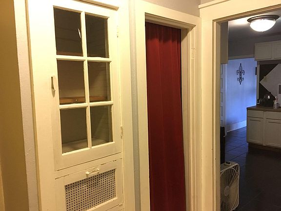 The back hallway has storage space.
