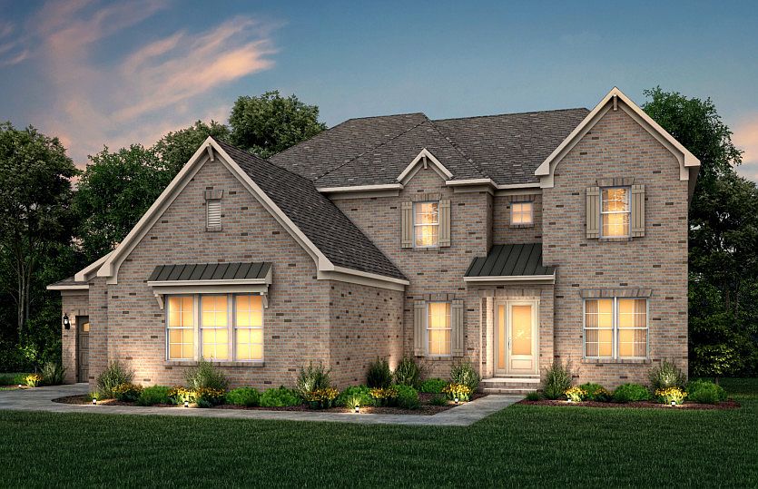 Hampton Exterior 16 features brick, covered front door and 3 car sideload garage
