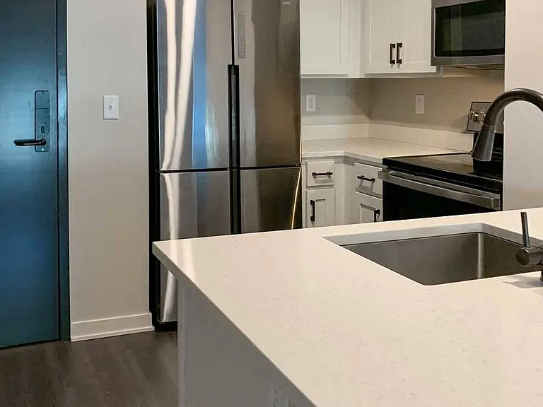 Cook up something special in this fully equipped, modern kitchen with stainless steel appliances.