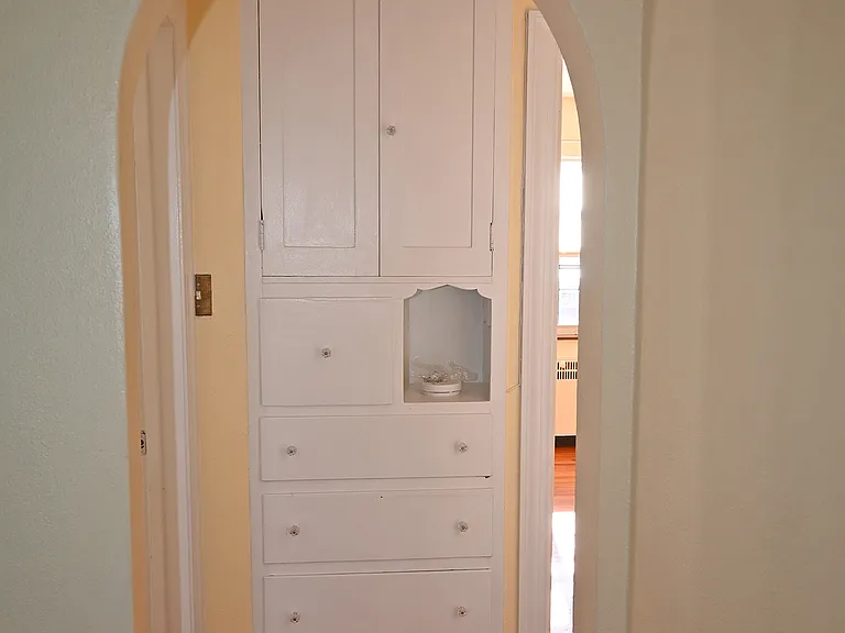 Hall closet opposite side of other closet. This is between both bedrooms