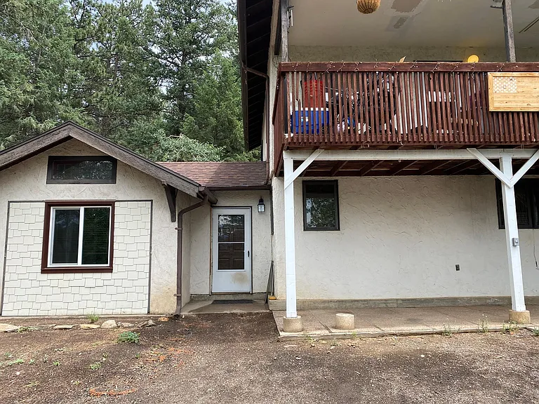 Wait till you hear the story of this exquisite duplex! It has quite a history. Lots of parking in the front and a space for a garden
