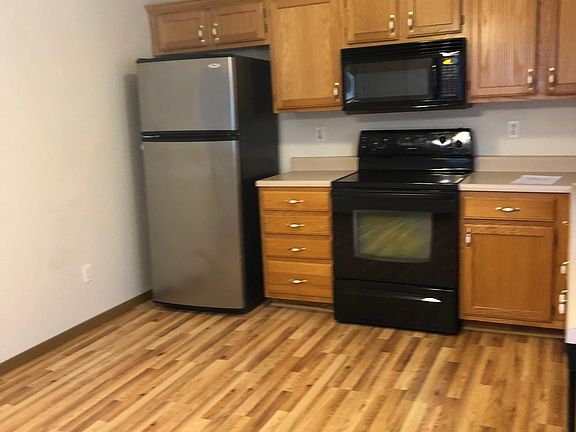 Large kitchen with appliances furnished