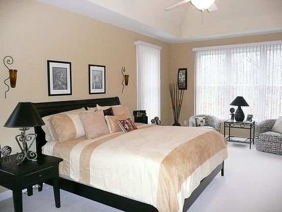 Oversized Master on Main with Custom Built Ins.