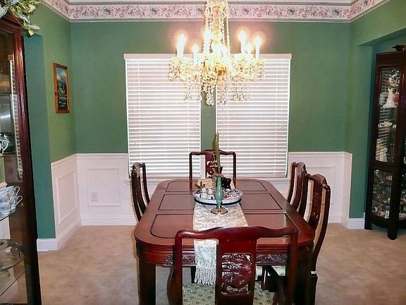 Large Dining room with chandlier