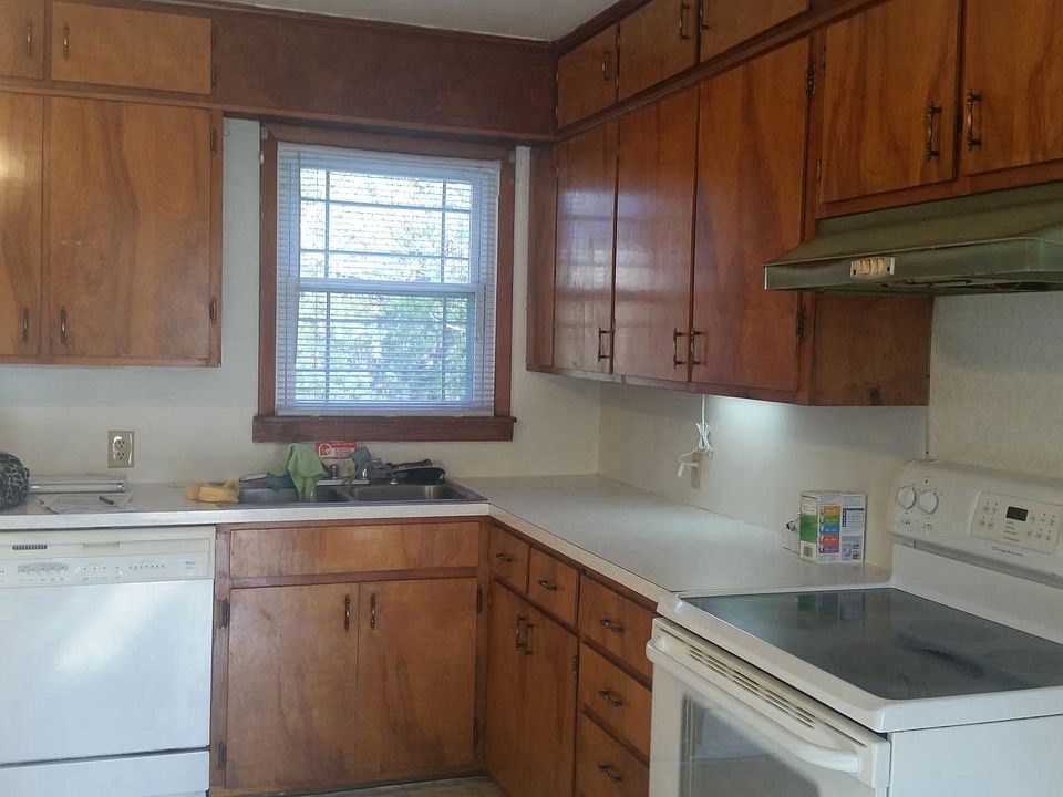 Large Eat-in Kitchen with lots of Cabinets and Double Sink. 