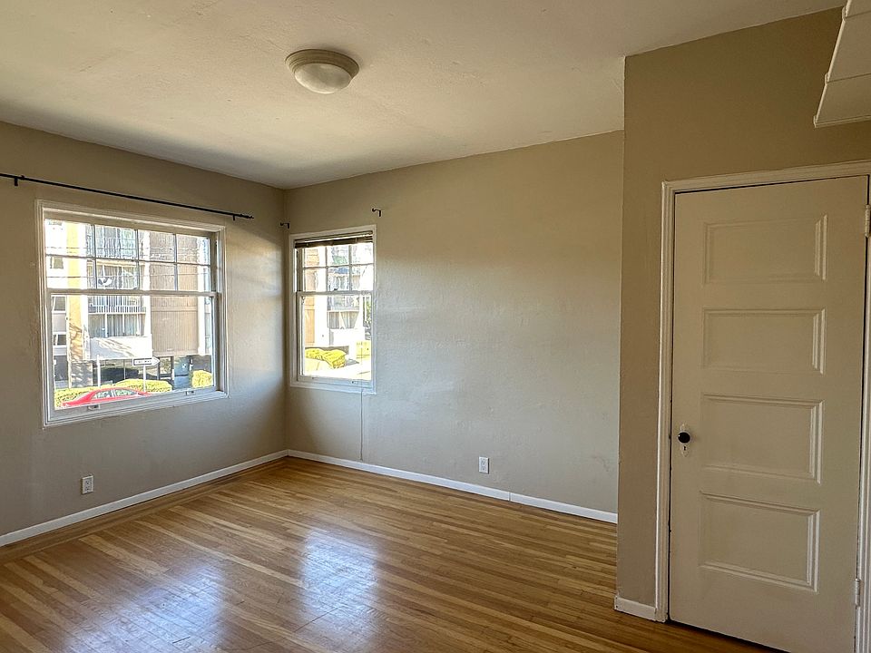 Bedroom with storage rack and closet