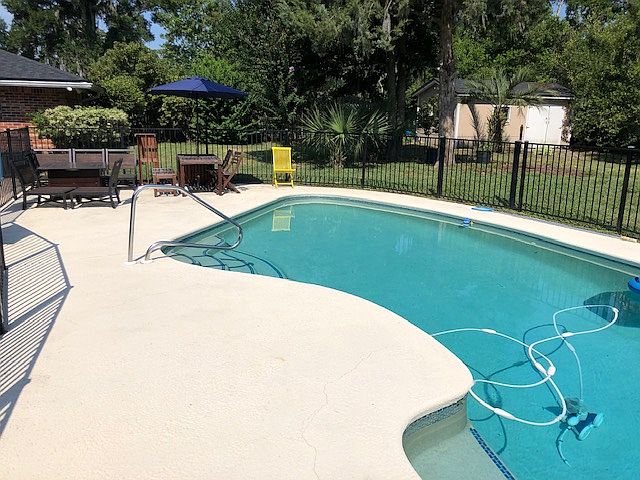 Fenced in pool w/ two gates