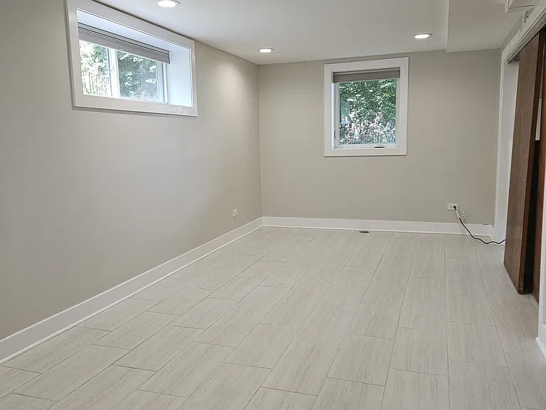 Lower Level bedroom/Rec room - Unstaged