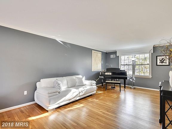 Formal Living Room with Gleaming Hardwoods