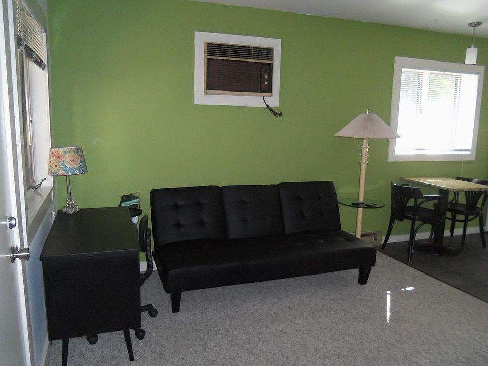 Couch folds into a double bed for a guest; linens included.