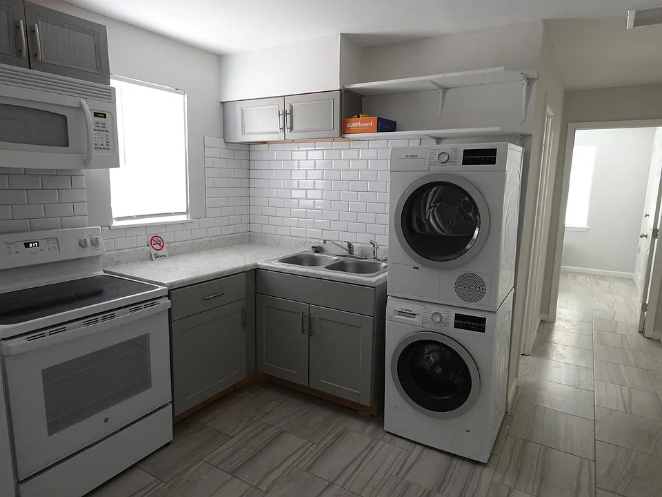 Kitchen. Please ignore the sign and box.