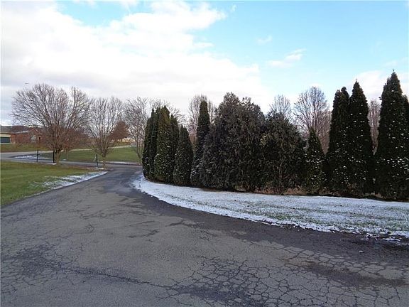 VILLA SITS BACK - DRIVEWAY BACK TO VILLA