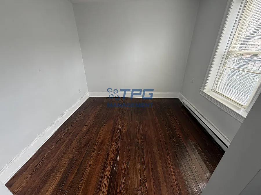 $500 off the first month's rent | Bright & Updated 1BR in Bayonne | Hardwood Floors | Vintage Cha... — Photo 3