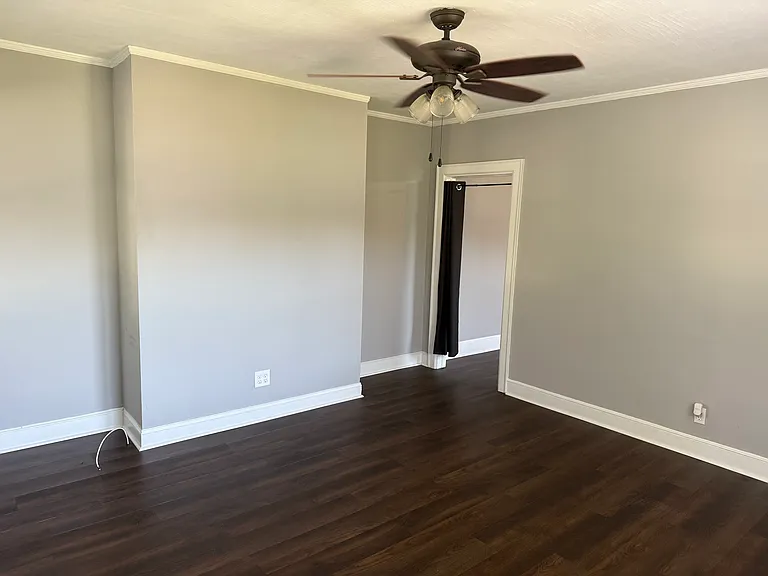 Living area, doorway to bedroom