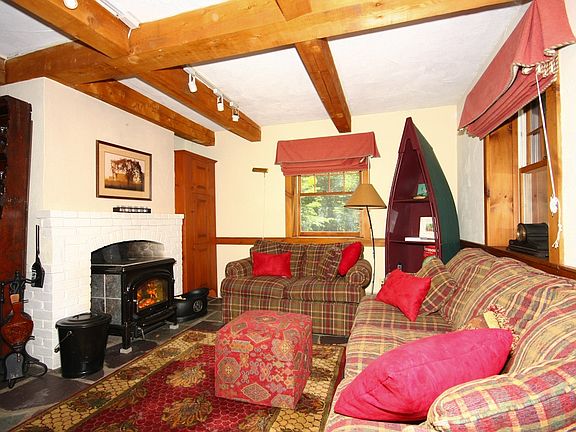 back living room with wood stove
