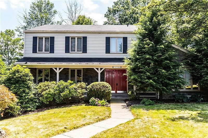 Extra large home in the middle of a cul-de-sac.  Nice covered front porch too