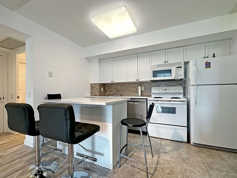 30 Harrison Garden Blvd #30 — Photo 5