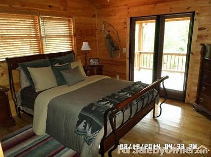 Upstairs Bedroom with Private Deck
						:
						Upstairs bedroom has private deck with great views, bathroom and large closet.