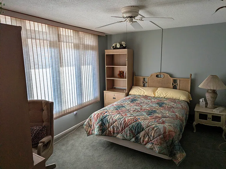 guest bedroom furnished with a queen size bed with a quality innerspring Kingsdown mattress