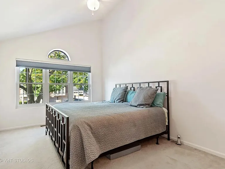 Master bedroom. Carpeting has been replaced with hardwood flooring (not shown)