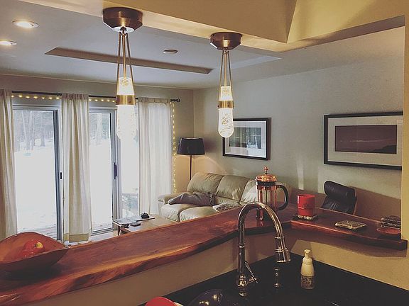 Sliding glass doors to lawn.