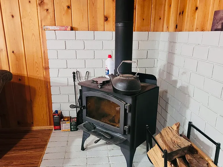 Stove top fireplace warms up the entire room on cold nights.