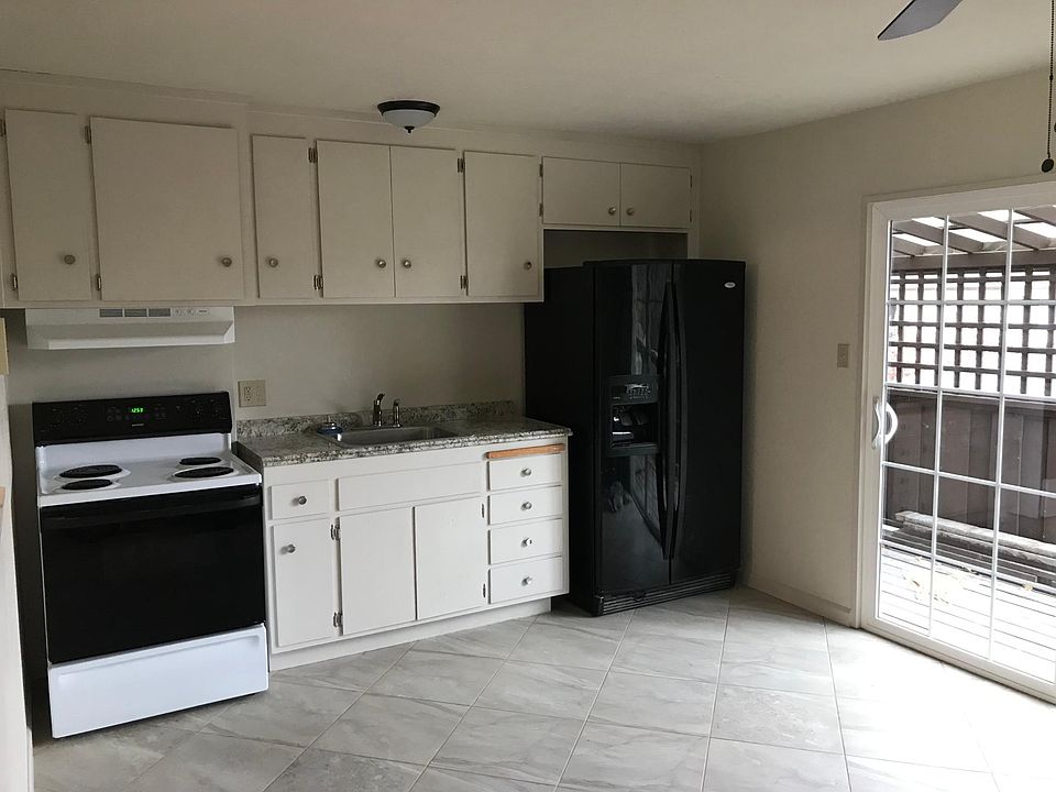 New tile floor, freshly painted cabinets, new countertop. New covered deck off of kitchen.