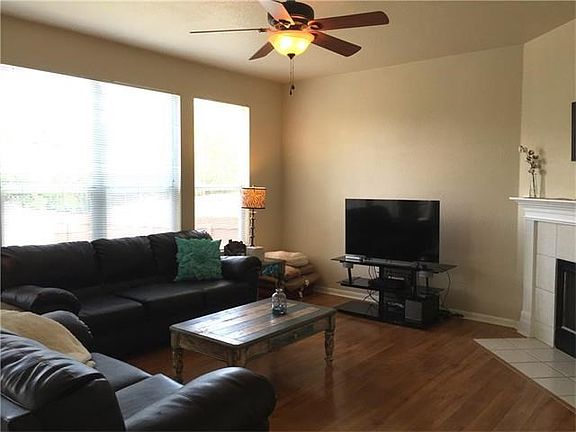 Beautiful hardwood floors, with cozy fireplace.  Plenty of sun light in this room!