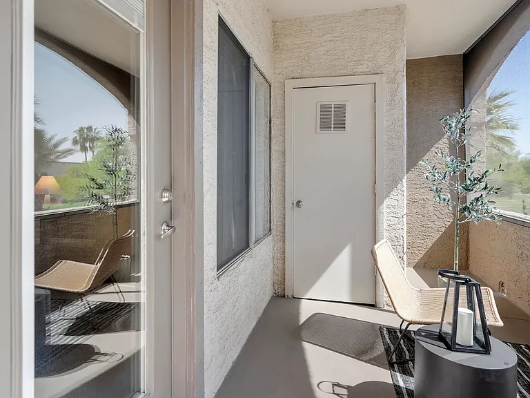 Revel into your screened-in private outdoor sanctuary featuring a convenient washer/dryer storage closet ensuring effortless living.