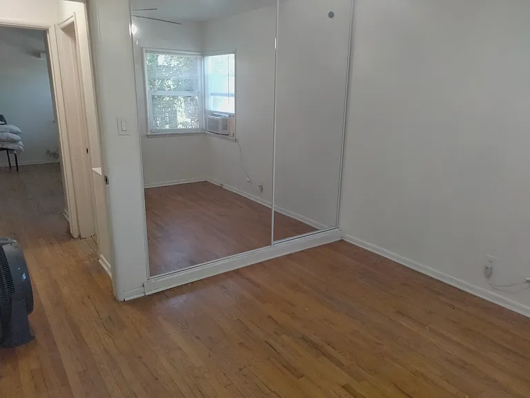 Bedroom - mirrored closet doors