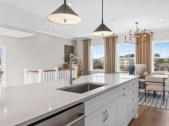Kitchen and Dining Area. Model Home Representation.