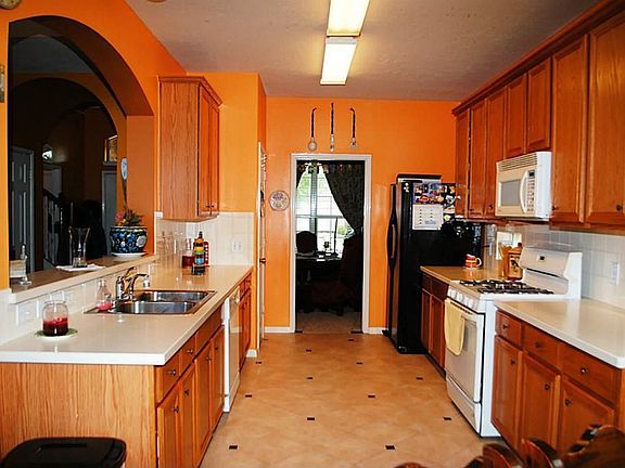 *Gorgeous kitchen with solid surface countertops and beautiful flooring*