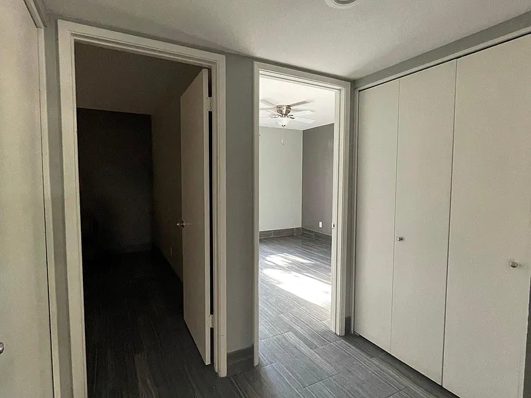 Linen Closet across Laundry Closet. Master Suite to the left and Bedroom I to the right.