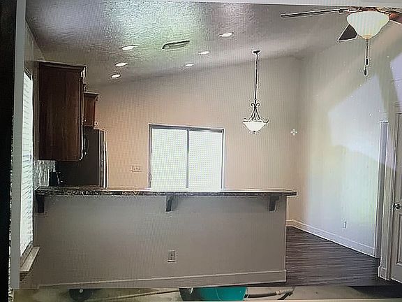 View into kitchen and dining