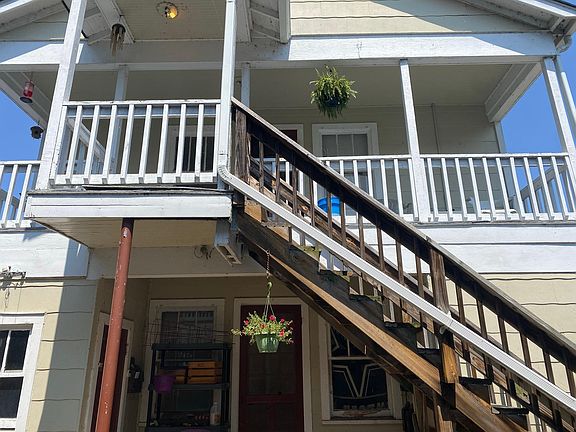 Stairs up to the entrance of the upstairs apartments.