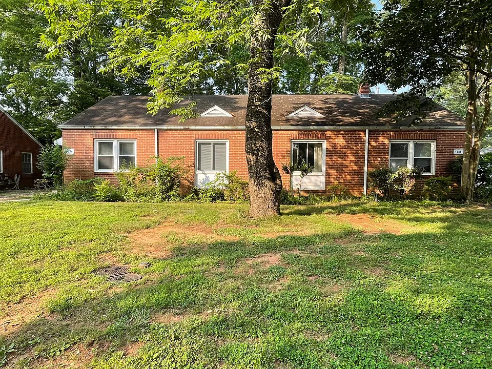 Front of the duplex. Apartment is located on the left side