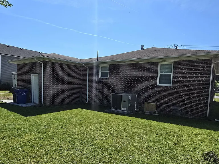 Spacious backyard offering plenty of space for entertaining or relaxing.